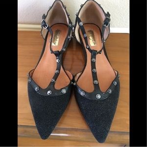 Halogen studded black flats